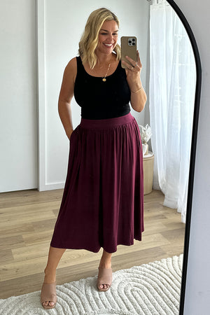 Pleated midi 2024 skirt burgundy